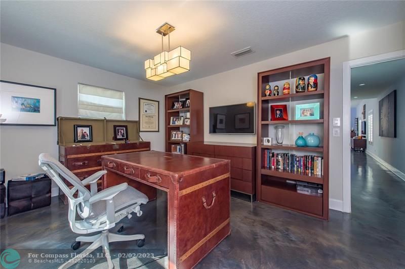 930 Northwest 4th Court Boca Raton, FL 33432 - Photo 14 of 28 a view of a room with furniture and chandelier