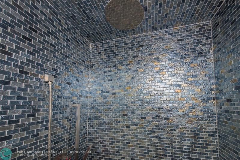 930 Northwest 4th Court Boca Raton, FL 33432 - Photo 17 of 28 a bathroom with a shower