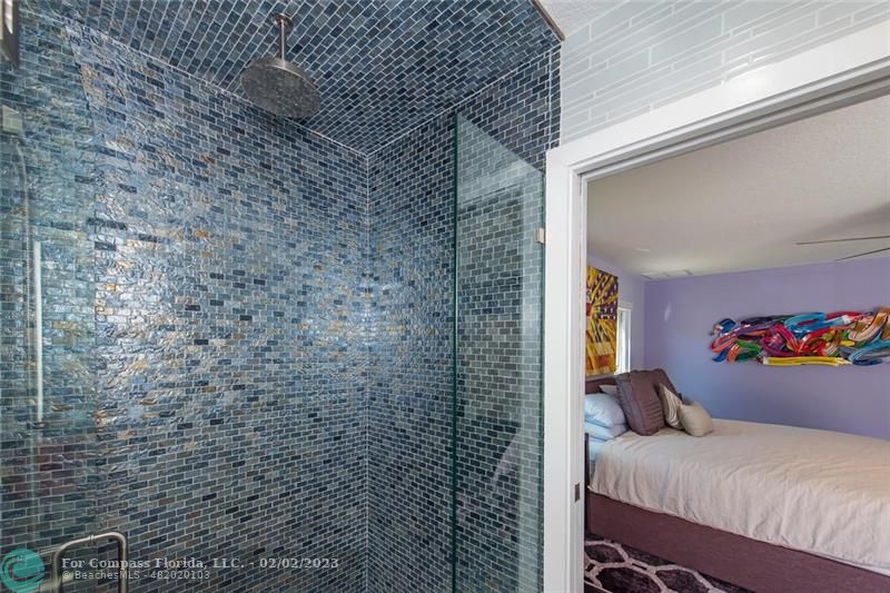 930 Northwest 4th Court Boca Raton, FL 33432 - Photo 18 of 28 a bathroom with a shower