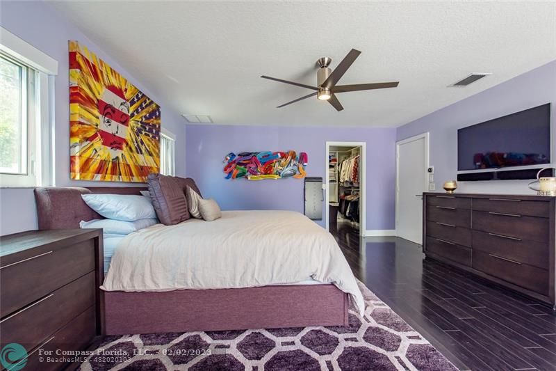 930 Northwest 4th Court Boca Raton, FL 33432 - Photo 20 of 28 a bedroom with a bed and furniture