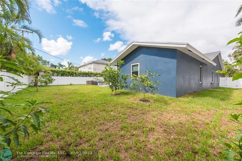 930 Northwest 4th Court Boca Raton, FL 33432 - Photo 28 of 28 a view of a house with a yard