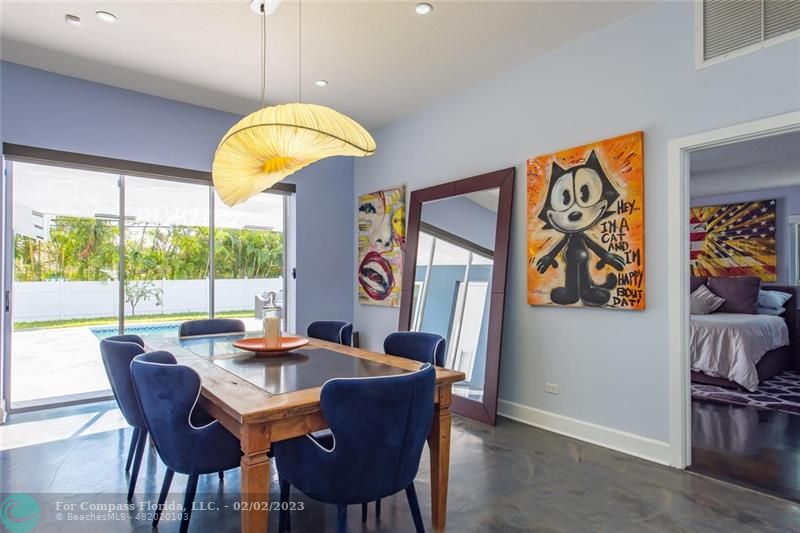 930 Northwest 4th Court Boca Raton, FL 33432 - Photo 4 of 28 a view of a dining room with furniture window and outside view