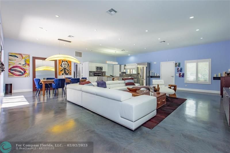 930 Northwest 4th Court Boca Raton, FL 33432 - Photo 9 of 28 a living room with furniture and wooden floor