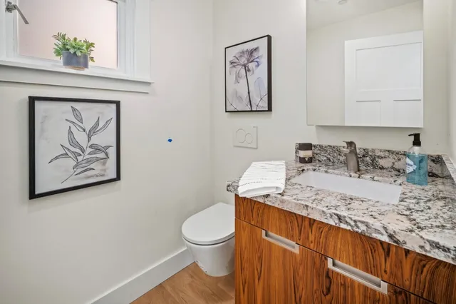 a view of a balcony with wooden floor