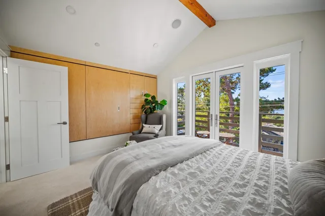 a bathroom with a granite countertop sink a bathtub and shower
