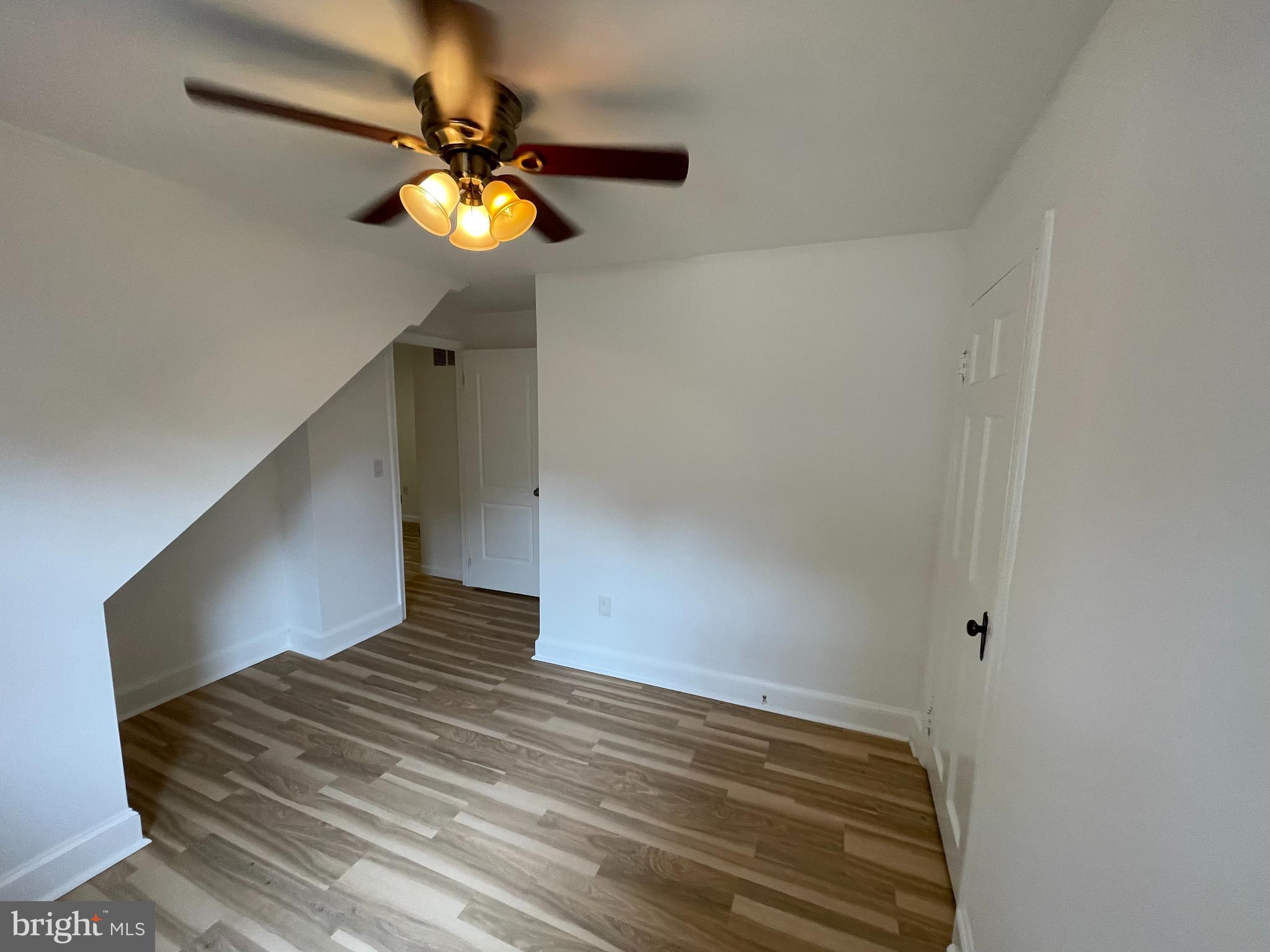 43 Silopanna Road, Unit B Annapolis, MD 21403 - Photo 12 of 16 a view of empty room with window and chandelier