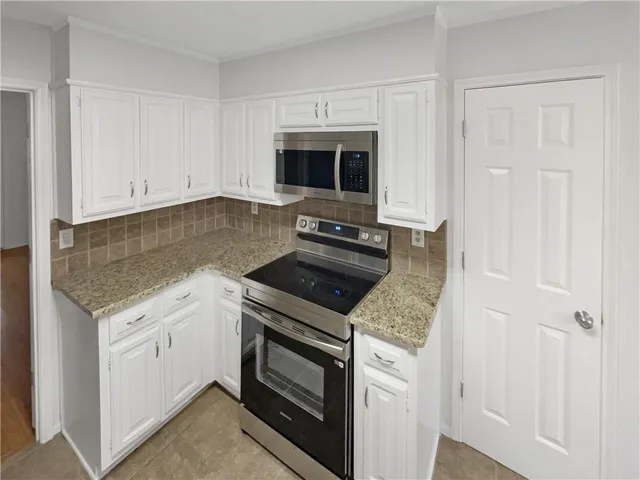 $313,000 | 6295 Windsor Trace Drive, Peachtree Corners, GA 30092