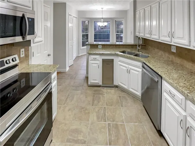 $313,000 | 6295 Windsor Trace Drive, Peachtree Corners, GA 30092