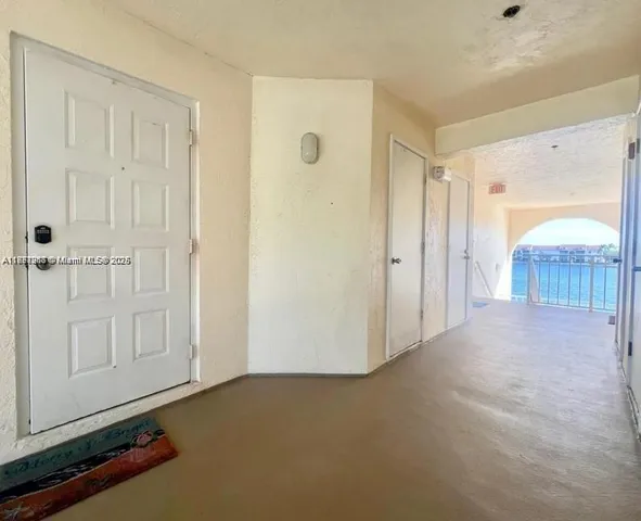 a view of a room with an empty space