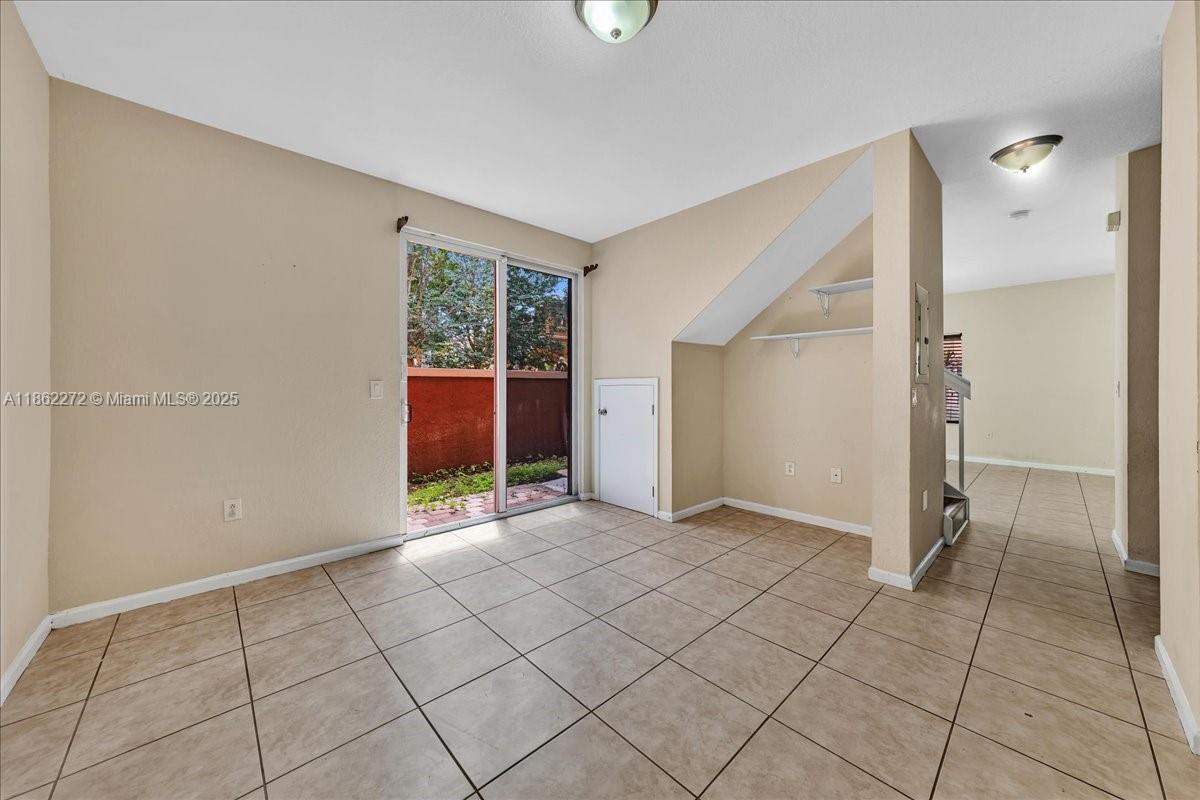 12252 Southwest 25th Court, Unit 1614 Miramar, FL 33025 - Photo 20 of 46 an empty room with windows