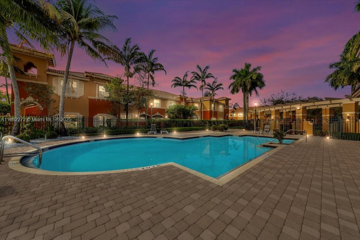 12252 Southwest 25th Court, Unit 1614 Miramar, FL 33025 - Photo 2 of 46 a view of outdoor space yard and swimming pool