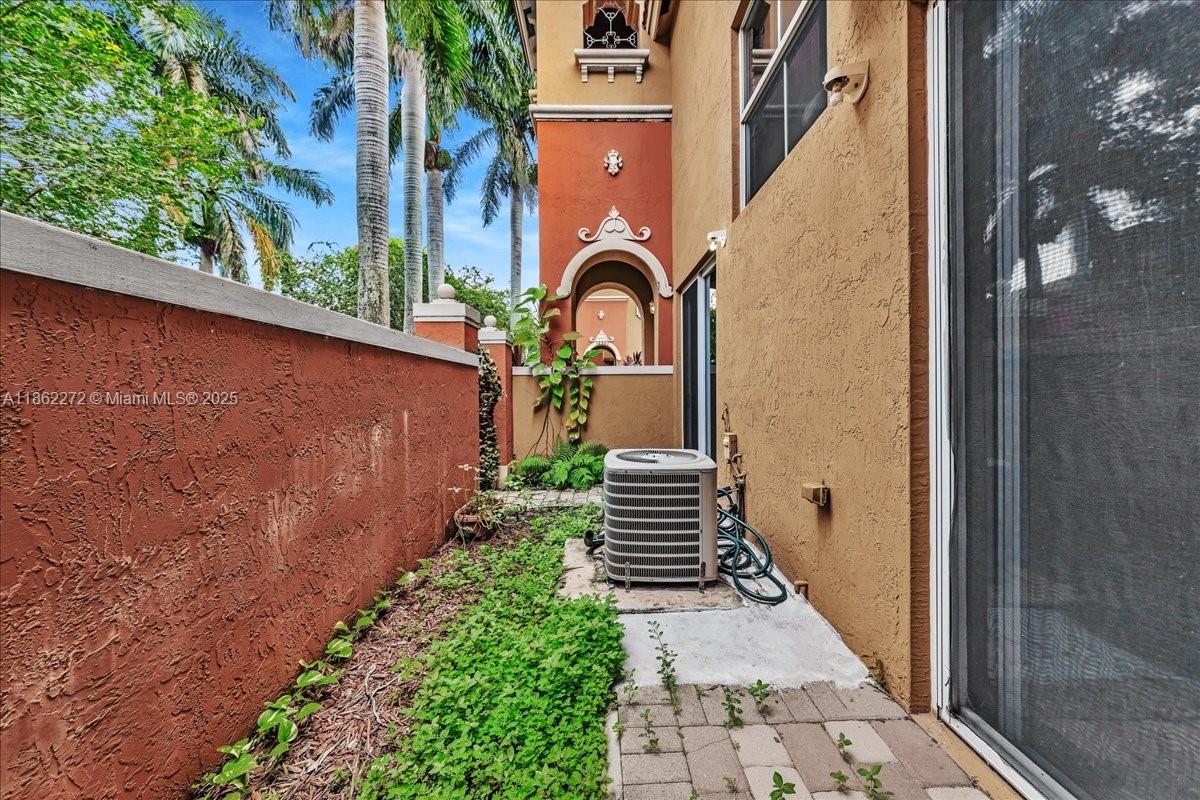 12252 Southwest 25th Court, Unit 1614 Miramar, FL 33025 - Photo 43 of 46 a house view with a outdoor space