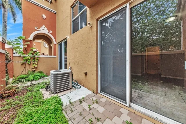 a backyard of a house with garden
