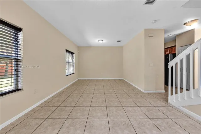 a view of an empty room and window