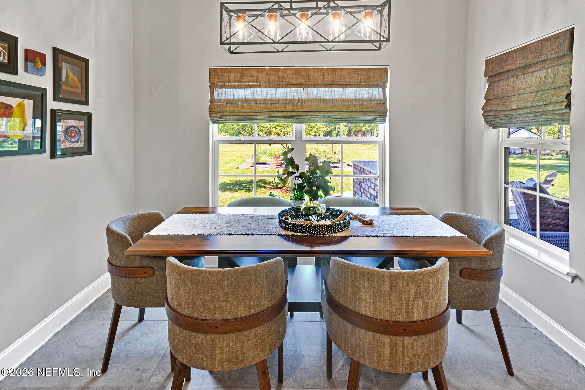 57353 Sandy Oaks Lane Callahan, FL 32011 - Photo 11 of 61 a view of a dining room with furniture window and outside view