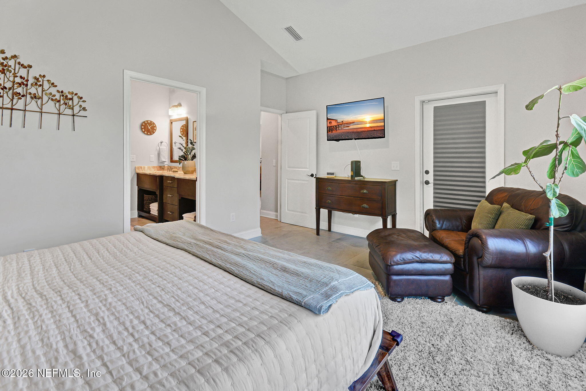 57353 Sandy Oaks Lane Callahan, FL 32011 - Photo 18 of 61 a bedroom with furniture and a window