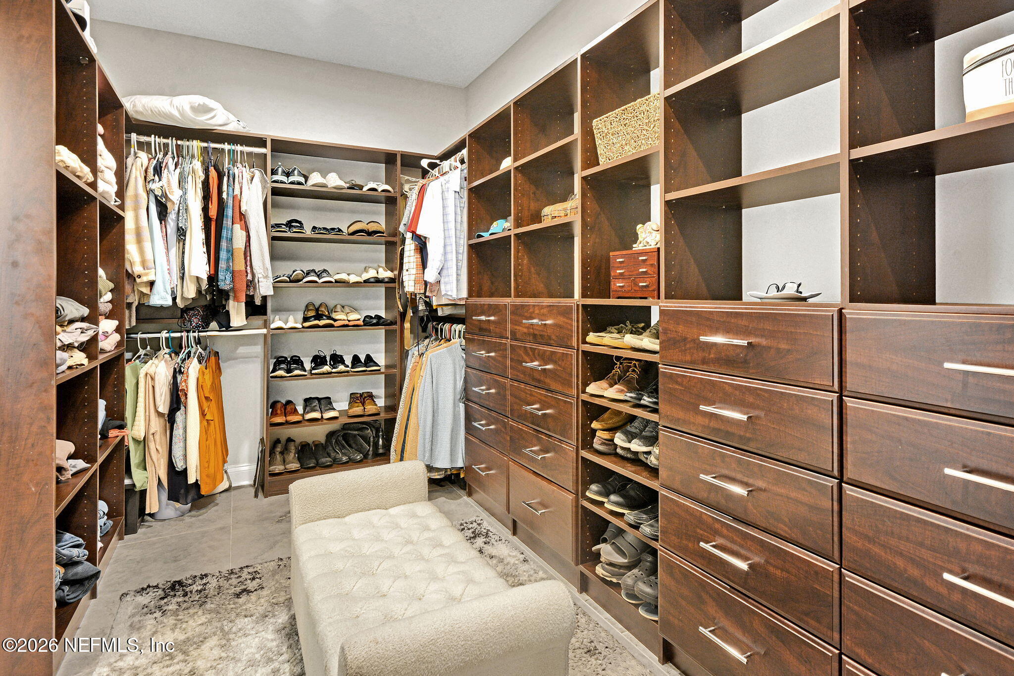 57353 Sandy Oaks Lane Callahan, FL 32011 - Photo 21 of 61 a view of walk in closet with clothes and shoes