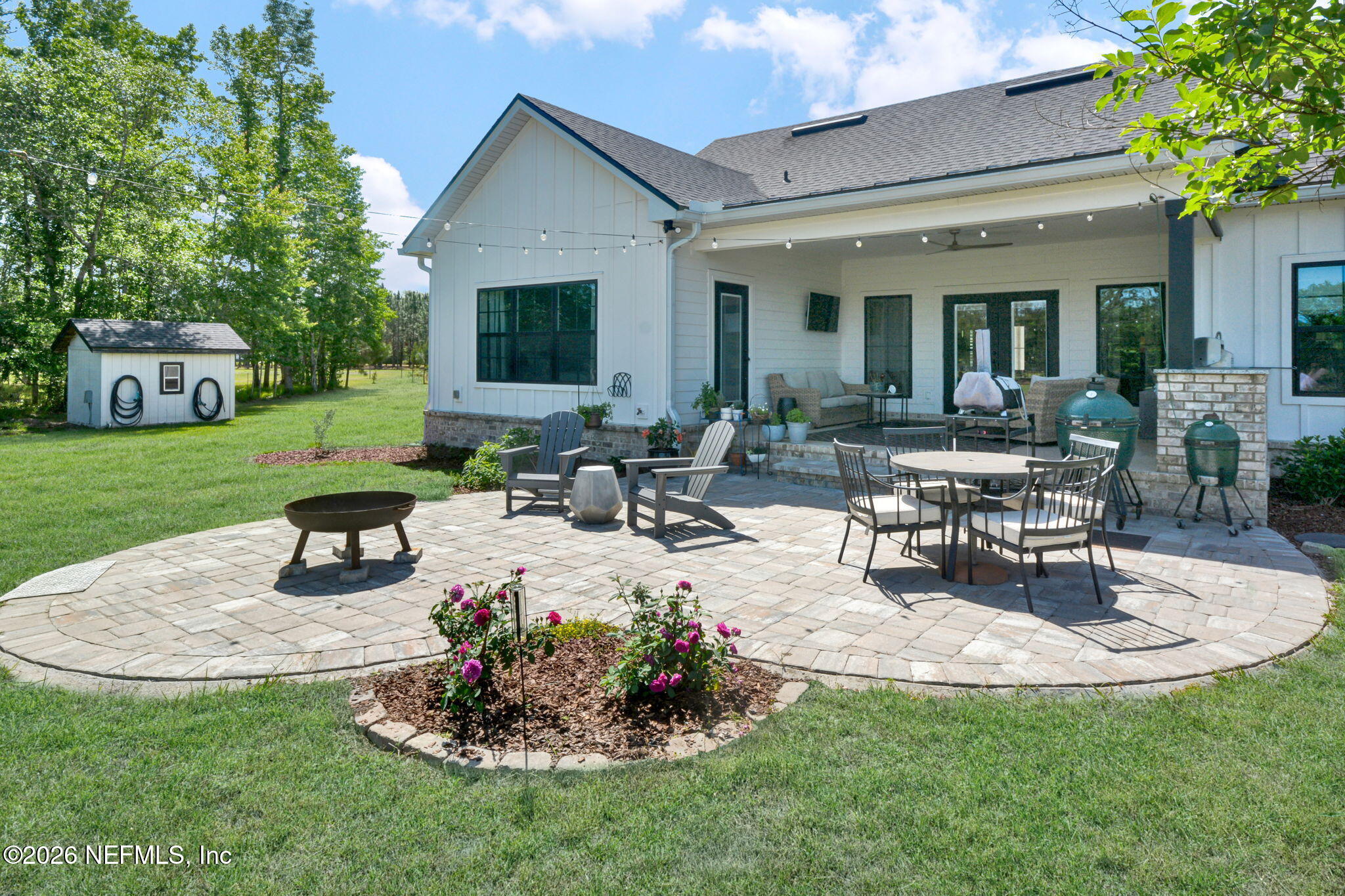 57353 Sandy Oaks Lane Callahan, FL 32011 - Photo 26 of 61 a view of a house with backyard and sitting area