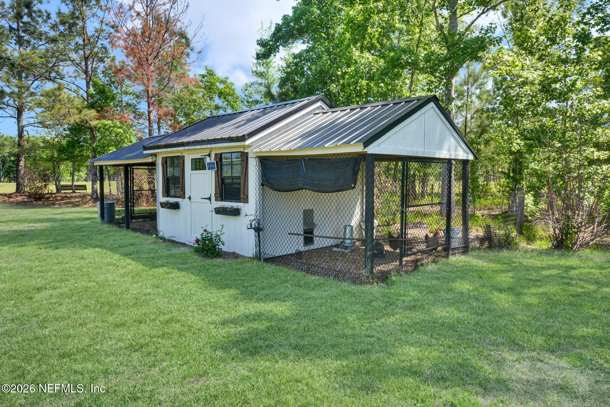 57353 Sandy Oaks Lane Callahan, FL 32011 - Photo 34 of 61 a view of a house with a yard