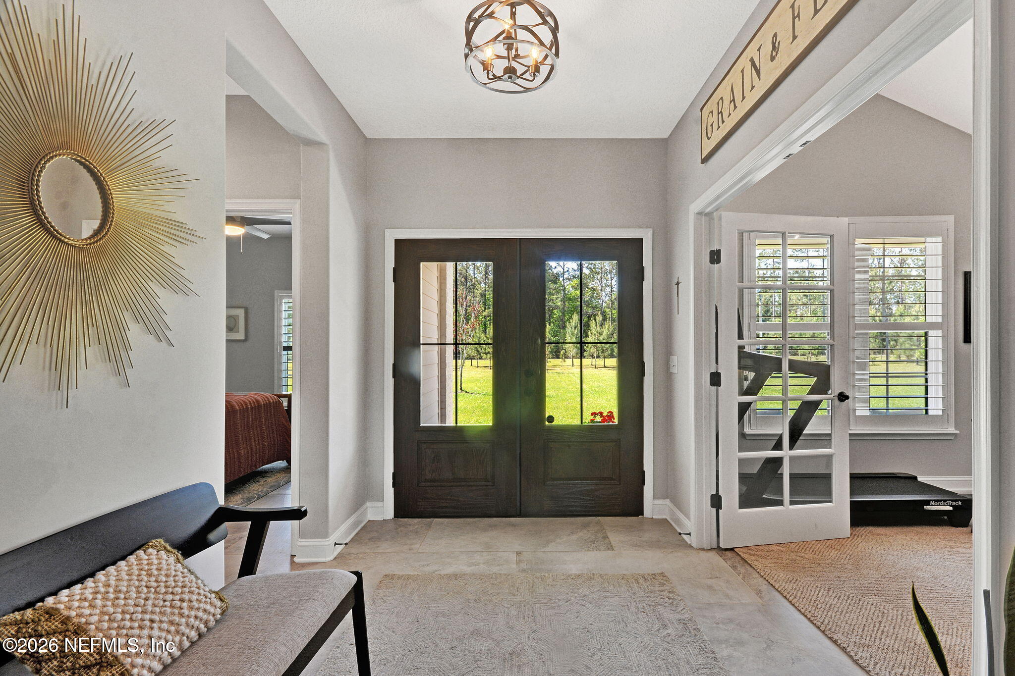 57353 Sandy Oaks Lane Callahan, FL 32011 - Photo 4 of 61 a view of an entryway with a livingroom