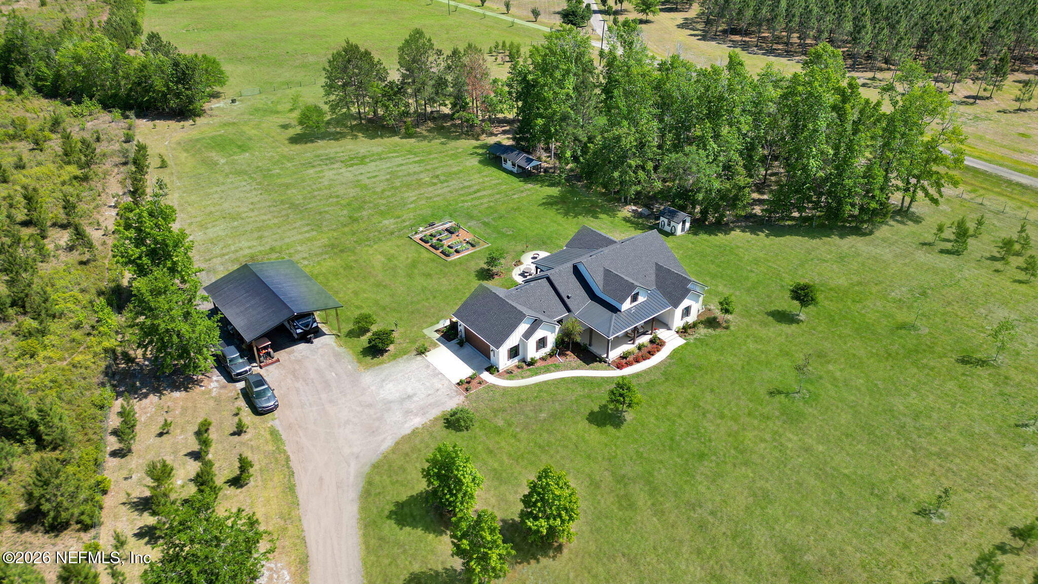 57353 Sandy Oaks Lane Callahan, FL 32011 - Photo 44 of 61 an aerial view of a house with outdoor space