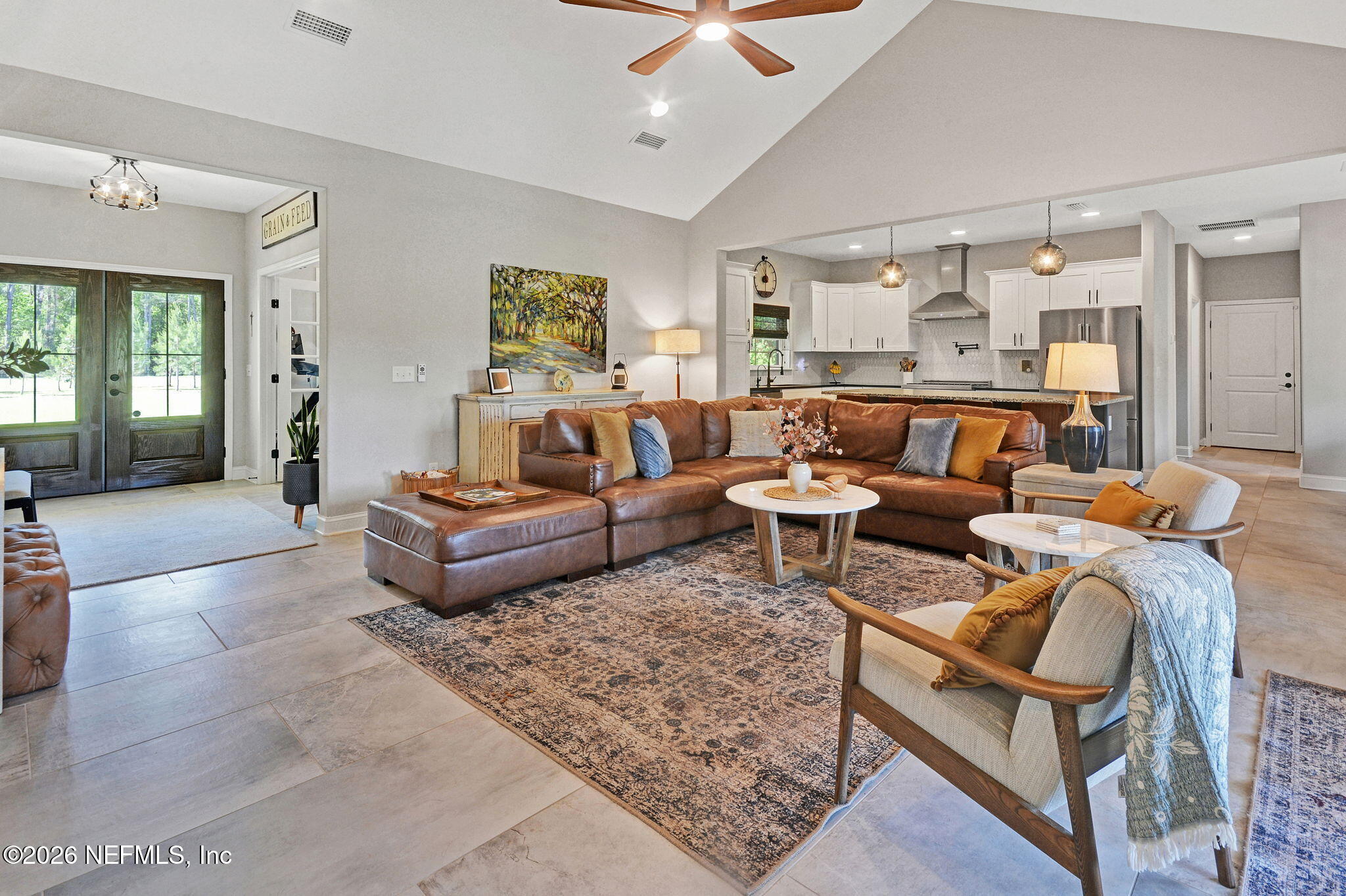 57353 Sandy Oaks Lane Callahan, FL 32011 - Photo 58 of 61 a living room with furniture and a rug