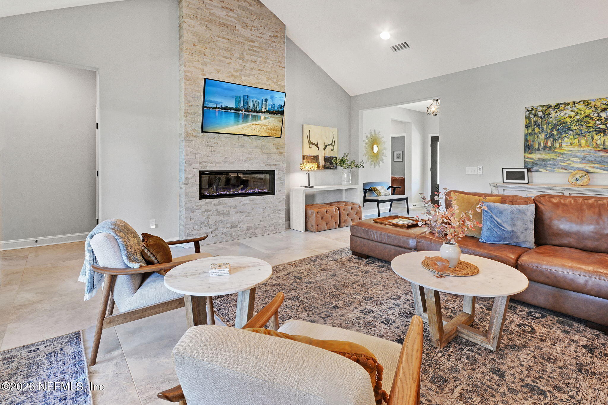 57353 Sandy Oaks Lane Callahan, FL 32011 - Photo 60 of 61 a living room with furniture and a fireplace