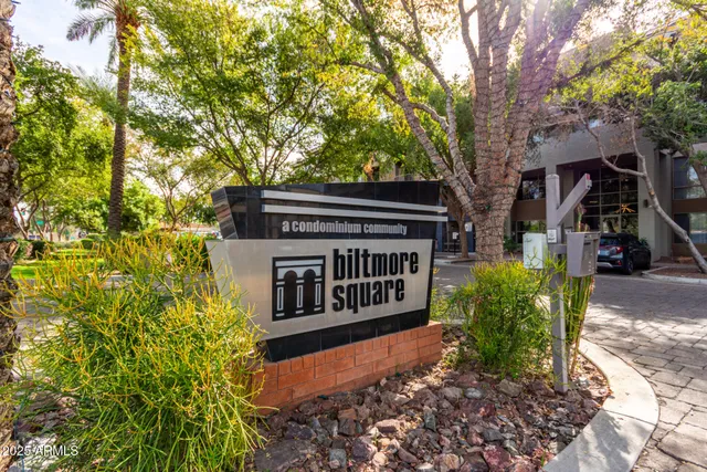a view of a house with a small yard