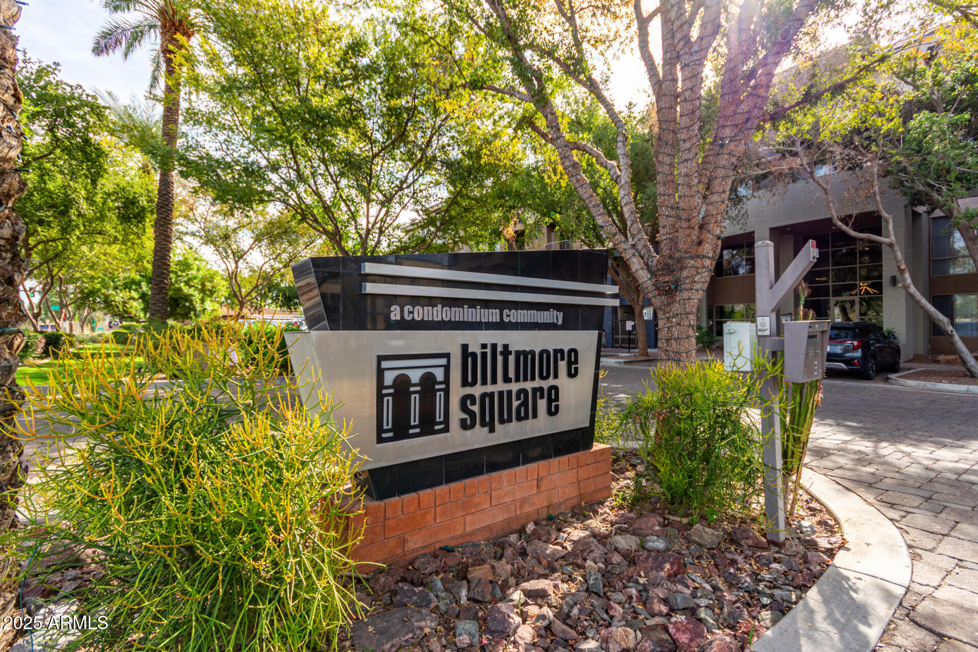 a view of a house with a small yard
