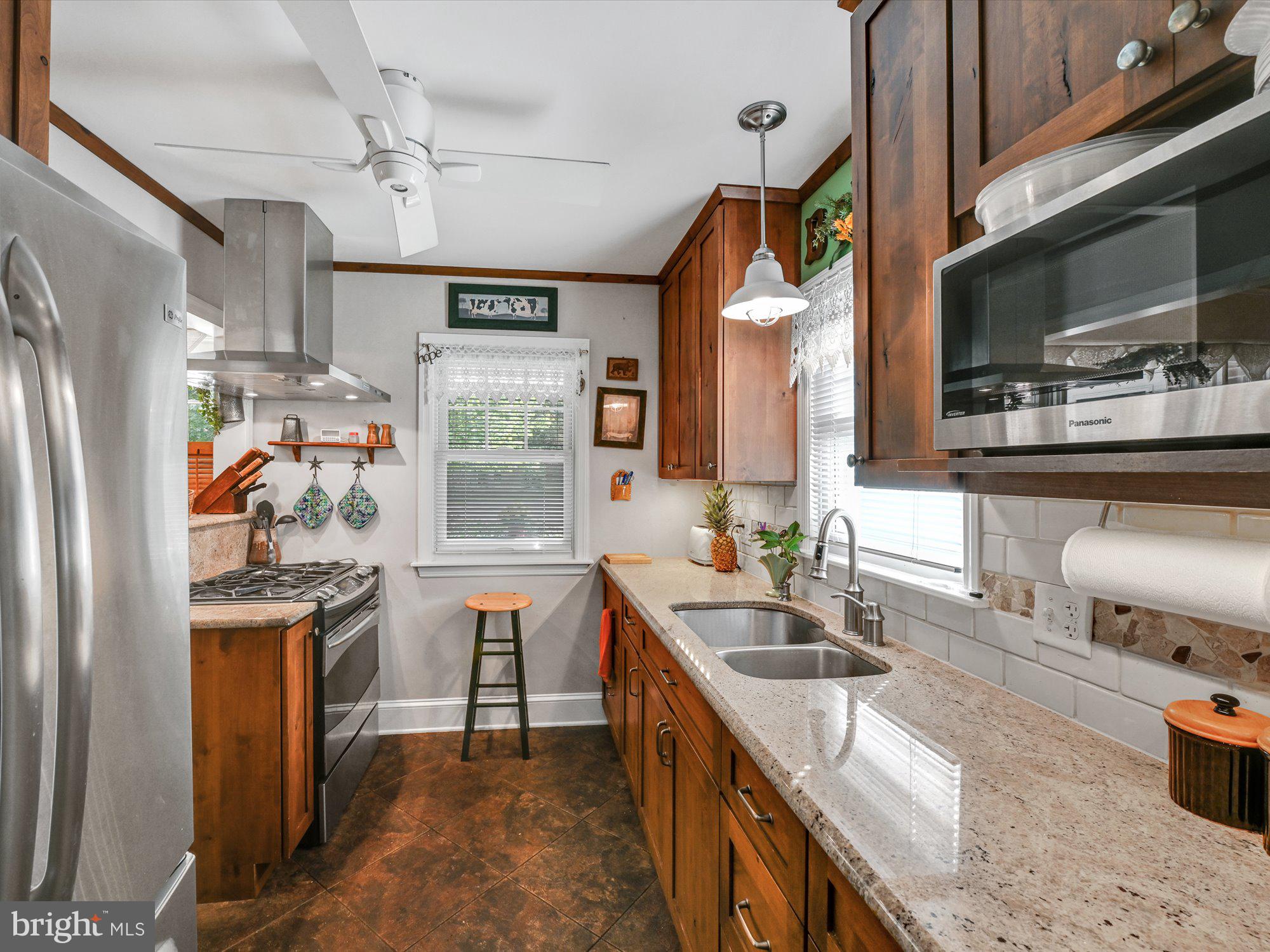 401 Devon Road York, PA 17403 - Photo 14 of 35 Kitchen with granite counters, tile backsplash