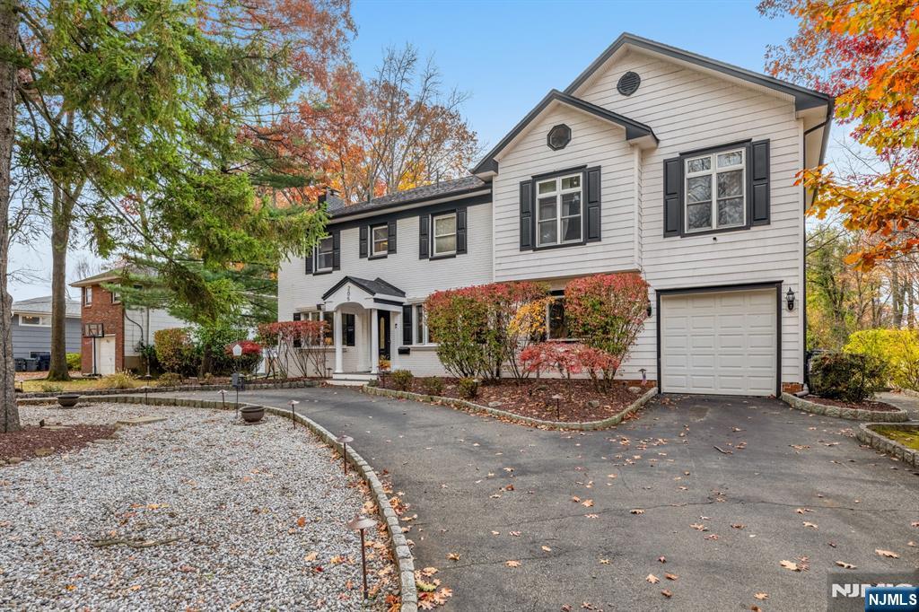 205 Davis Avenue Hackensack, NJ 07601 - Photo 1 of 47 a front view of a house with a yard