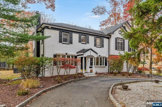 front view of a house with a small yard