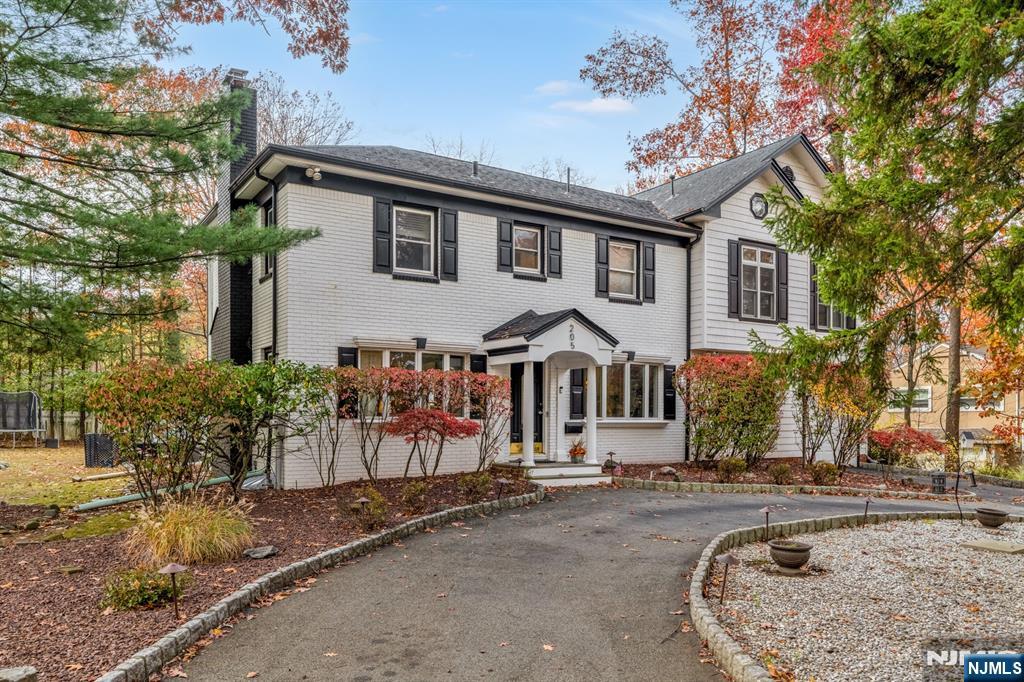205 Davis Avenue Hackensack, NJ 07601 - Photo 2 of 47 front view of a house with a small yard