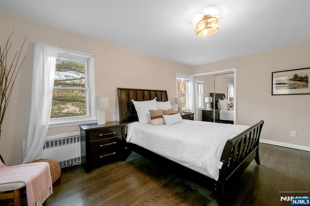 205 Davis Avenue Hackensack, NJ 07601 - Photo 27 of 47 a bedroom with a bed and a table