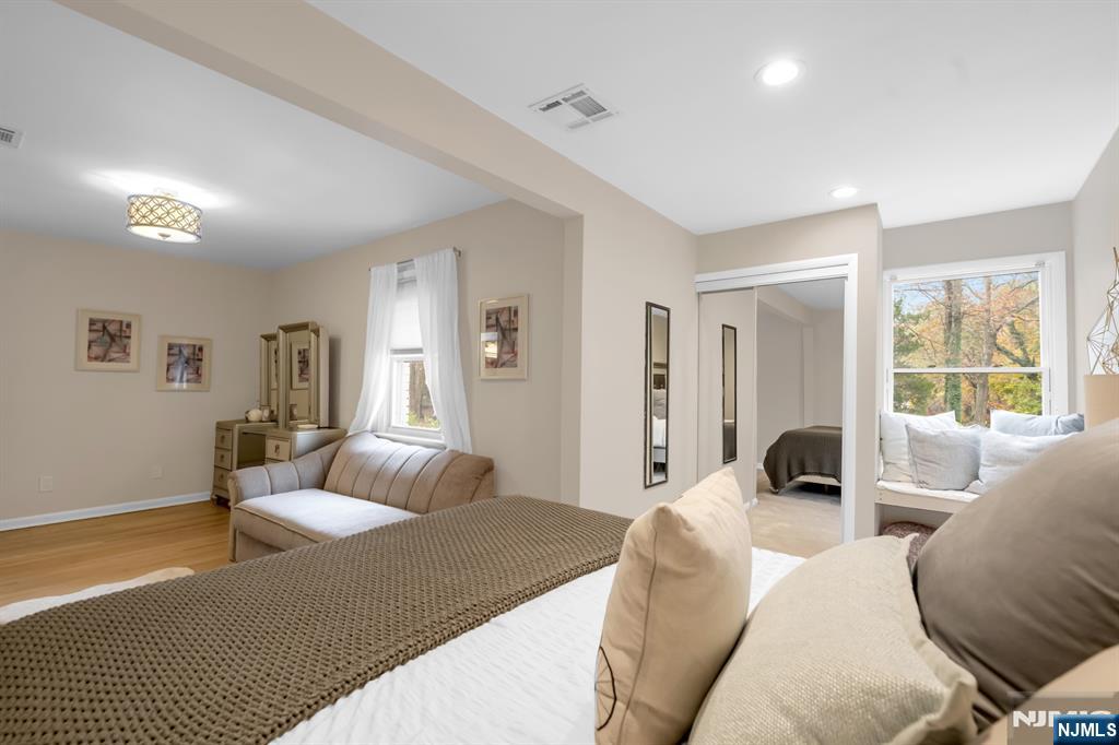 205 Davis Avenue Hackensack, NJ 07601 - Photo 33 of 47 a bedroom with a bed and glass window