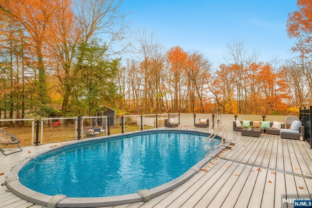 205 Davis Avenue Hackensack, NJ 07601 - Photo 43 of 47 a view of a swimming pool with a patio