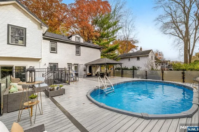 a view of a house with swimming pool