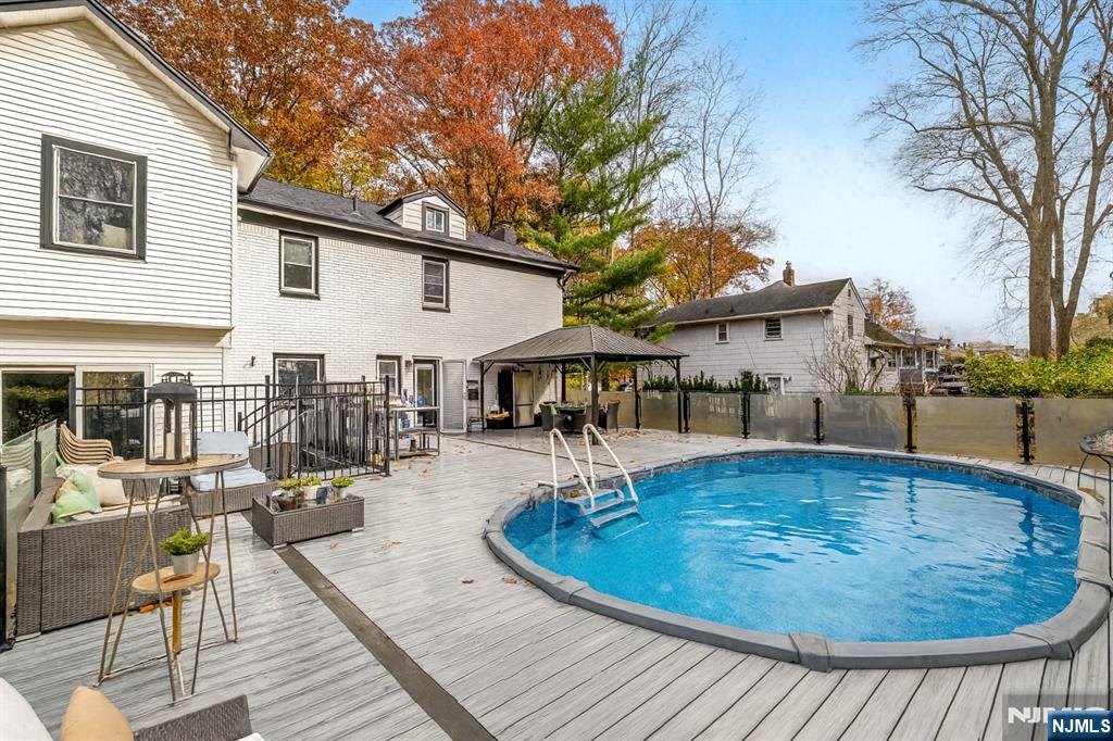 205 Davis Avenue Hackensack, NJ 07601 - Photo 44 of 47 a view of a house with swimming pool