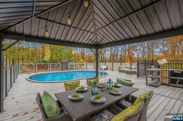 a dining room with furniture window and outside view