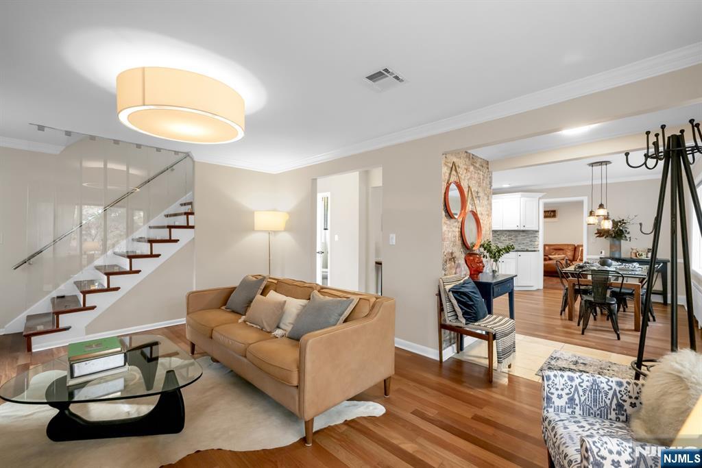 205 Davis Avenue Hackensack, NJ 07601 - Photo 5 of 47 a living room with furniture and wooden floor