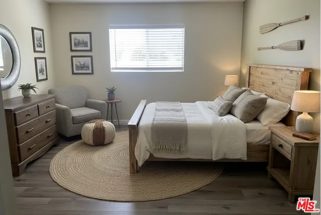 a view of a lake with a large barn with large tree