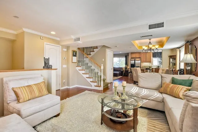 a kitchen with a stove a sink and a refrigerator