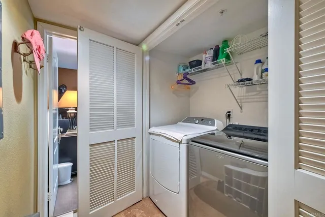 an aerial view of residential building with parking space