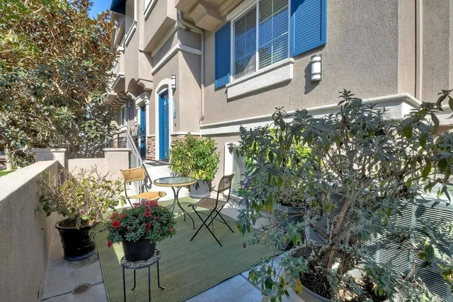 a view of a lake with houses in the back