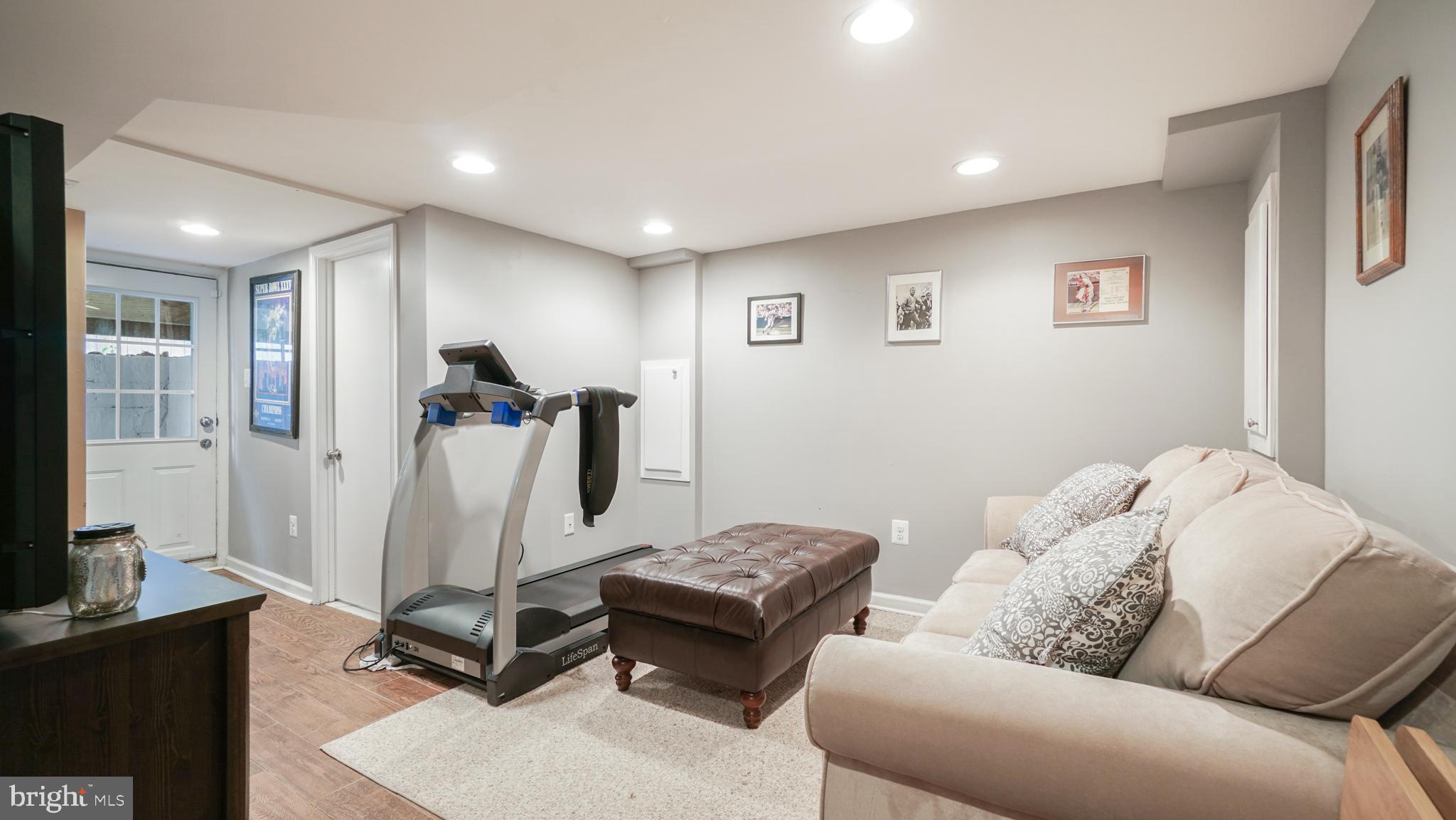 2709 Byron Street Silver Spring, MD 20902 - Photo 14 of 21 LL Rec room w/ backyard access, recessed lighting