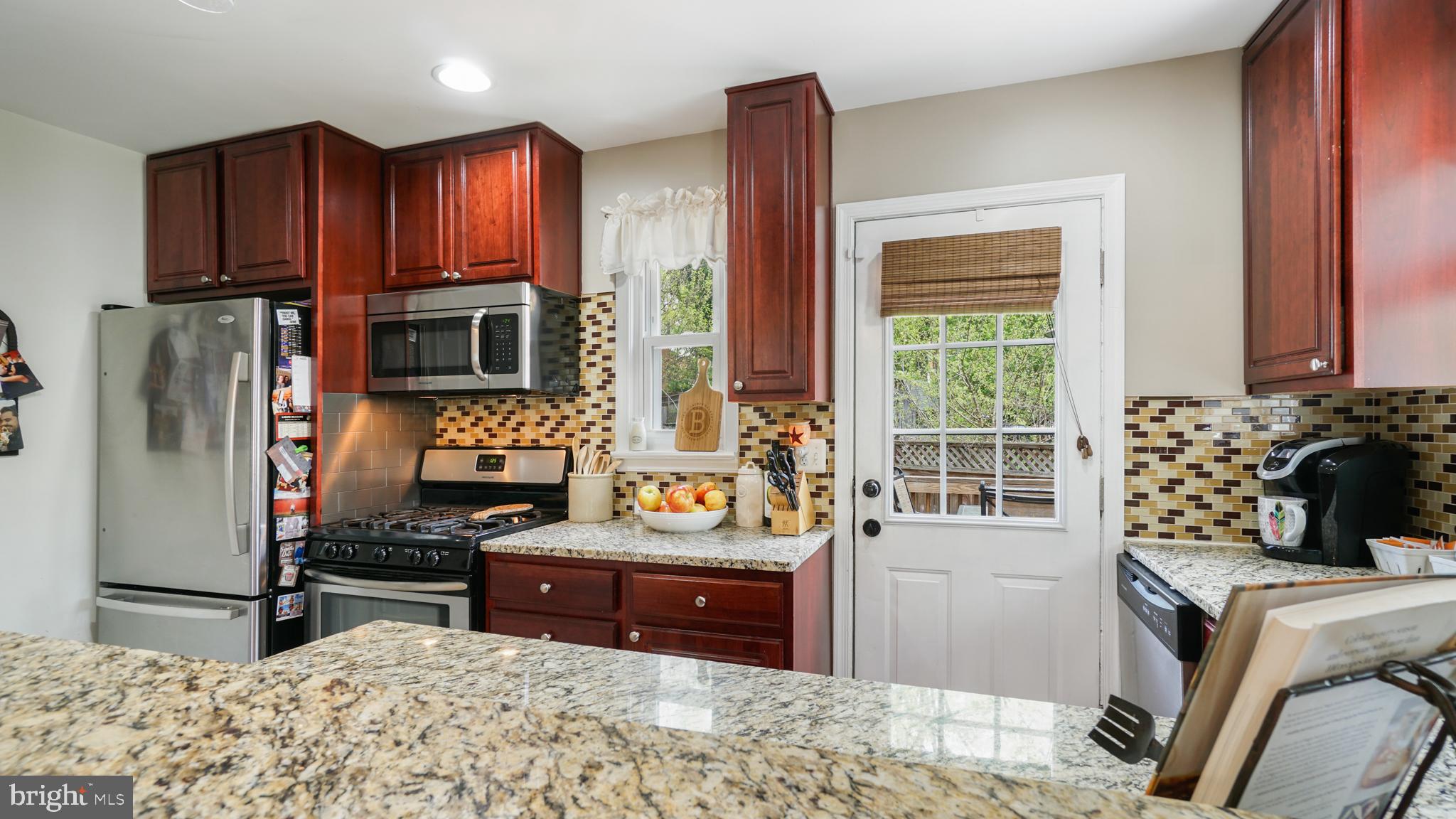 2709 Byron Street Silver Spring, MD 20902 - Photo 3 of 21 SS appliances, gas range & deck access off kitchen
