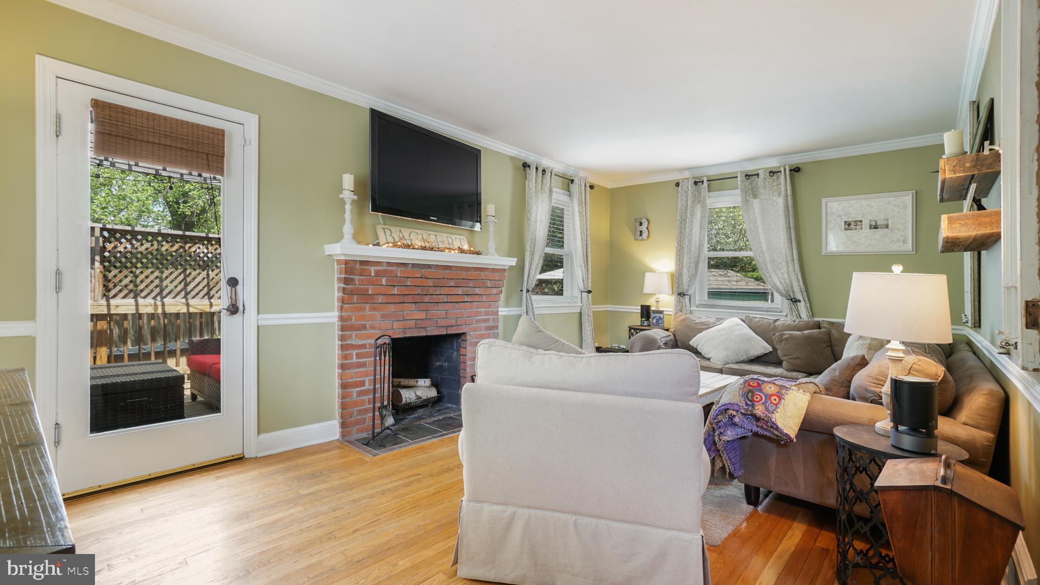 2709 Byron Street Silver Spring, MD 20902 - Photo 6 of 21 Living Room w/ access to second deck, wood floors