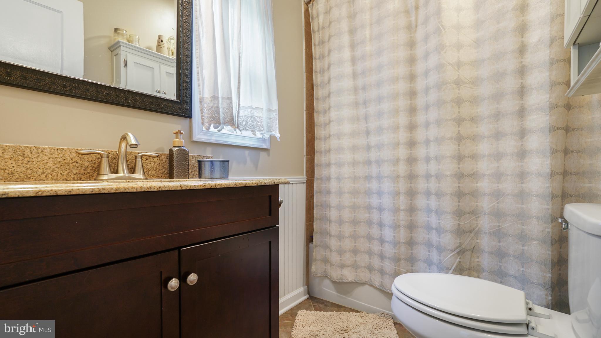 2709 Byron Street Silver Spring, MD 20902 - Photo 10 of 21 Upper renovated full bathroom w/ natural light