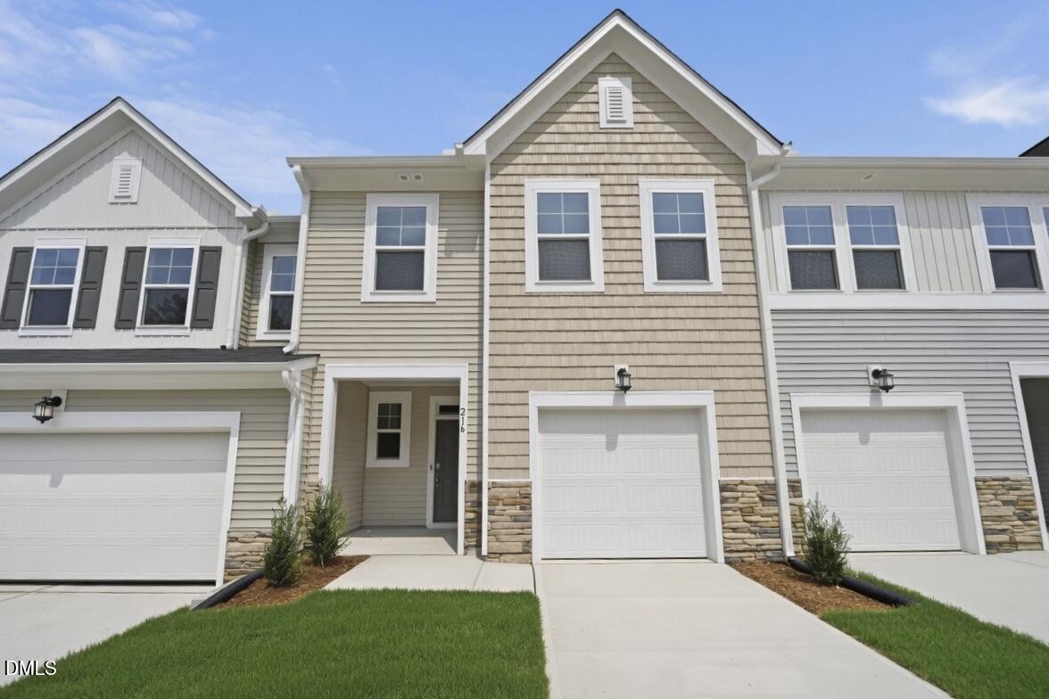 216 Tree Moss Court Rolesville, NC 27571 - Photo 1 of 31 SUN_ParkerRidgeTownes_CarsonII_QMI