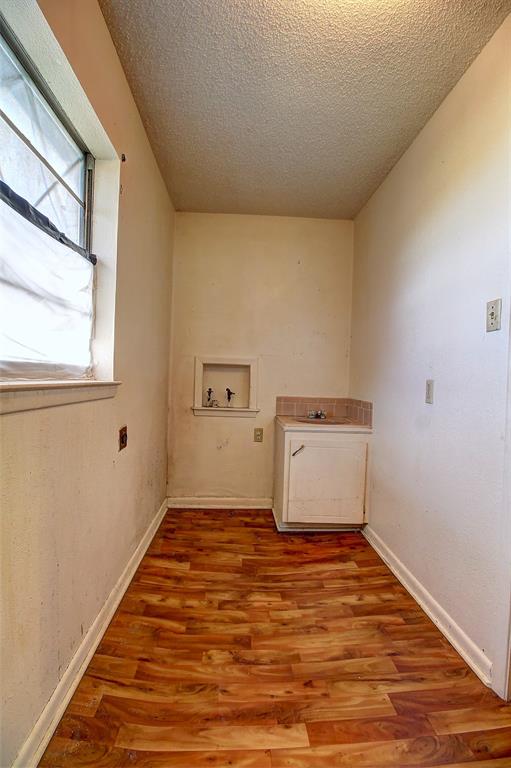 512 North Sherley Road Anna, TX 75409 - Photo 15 of 20 a room with a wooden floor and a window